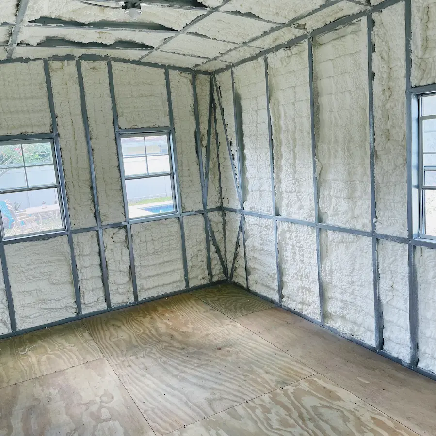 Closed-cell spray foam insulation applied to wall cavities in a residential project in Sunset